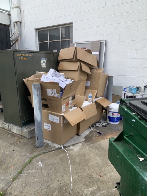 Cardboard boxes stacked for a commercial junk pickup